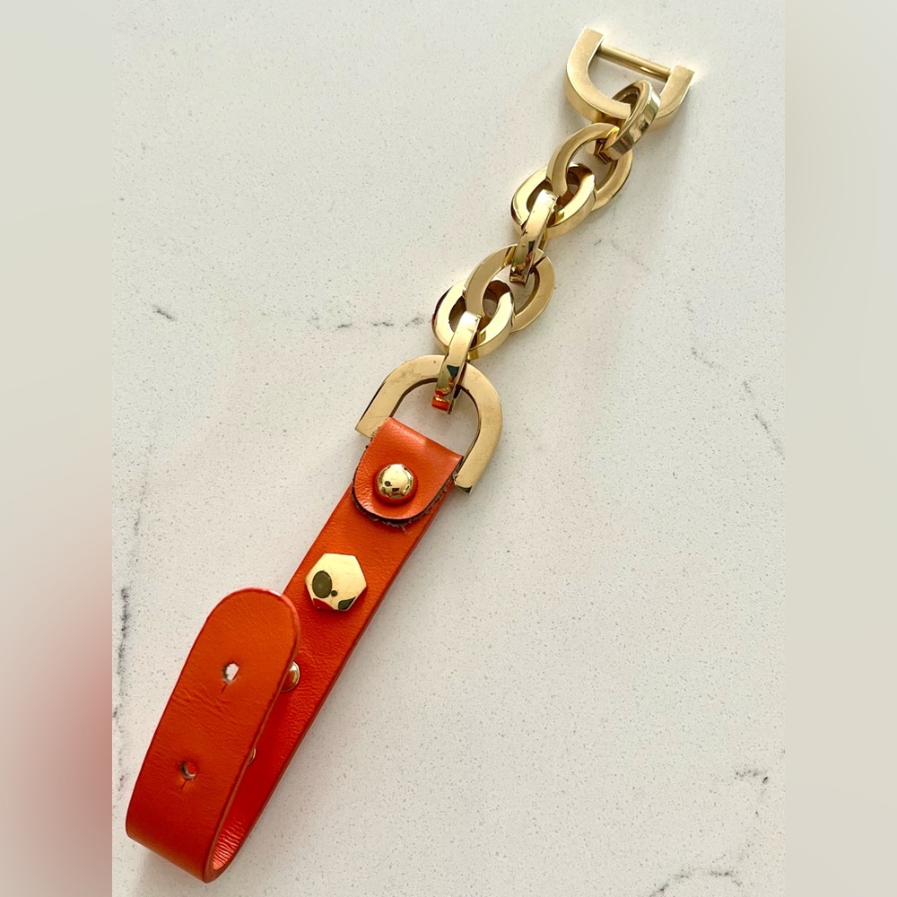 Orange Leather and Gold Tone Chain Bracelet.  Fits up to 8” wrist Like New!